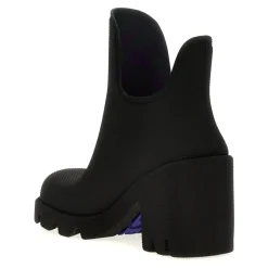 Asymmetrische enkellaars met chunky hak