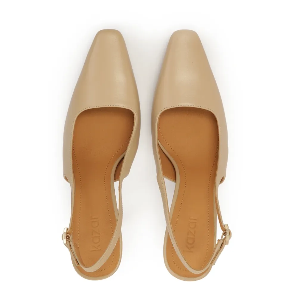 Beige pumps met een unieke hak